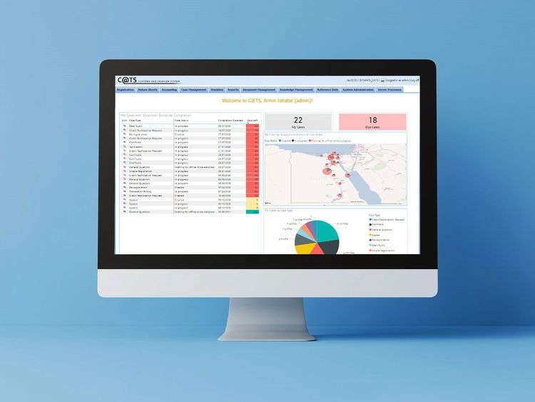 Computerbildschirm zeigt Steuerverwaltungs-Dashboard mit Tabellen, Karten und Tortendiagramm zur Überwachung von Steuerdaten