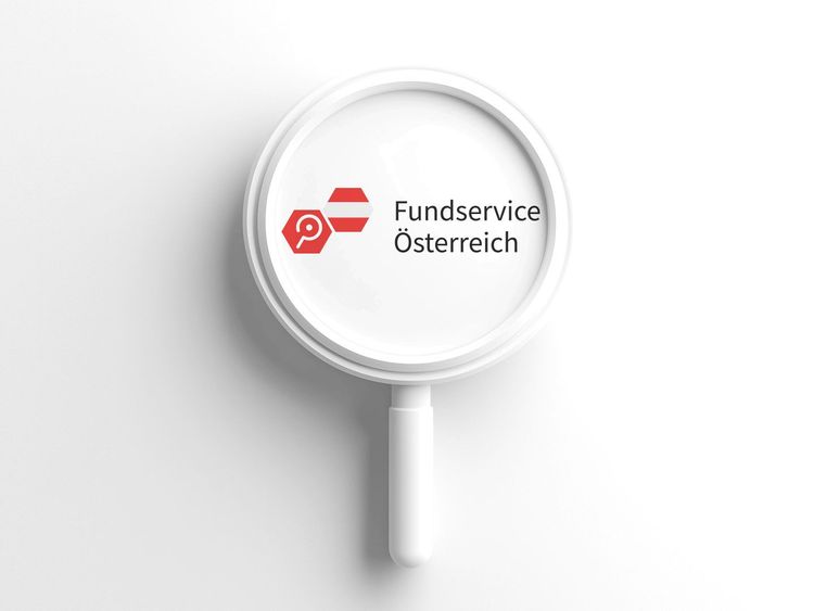 Lupe mit dem Logo und Schriftzug 'Fundservice Österreich' auf weißem Hintergrund